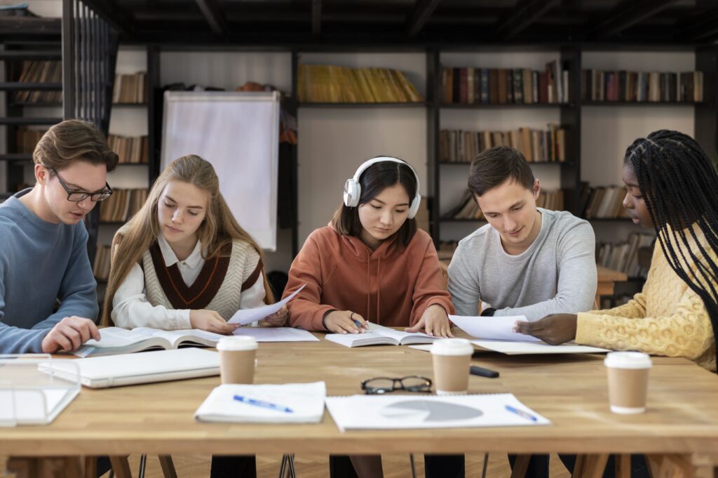 Students studying in a modern library, representing seamless B.Tech credit transfer opportunities.